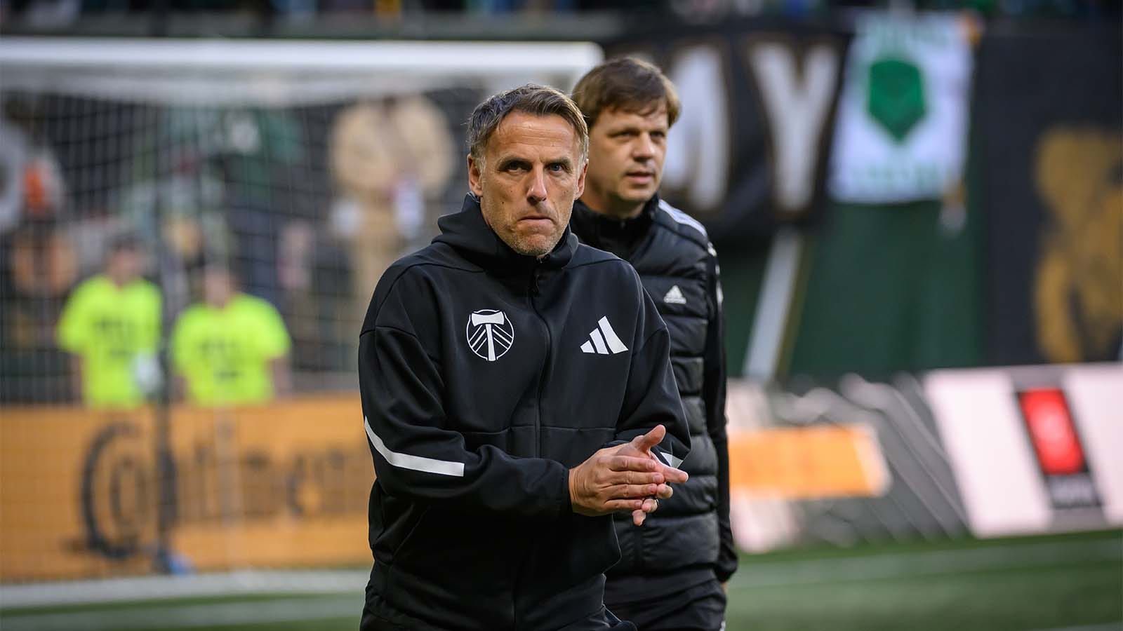 Phil Neville coaching with the Timbers