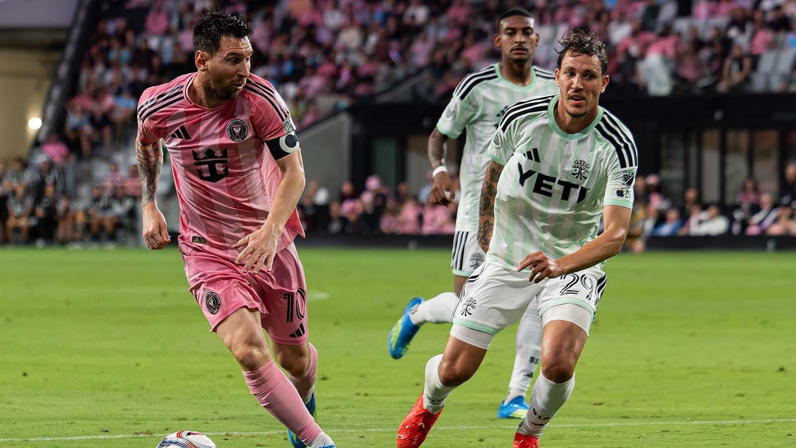 Inter Miami's Lionel Messi playing against Austin FC's Guilherme Biro