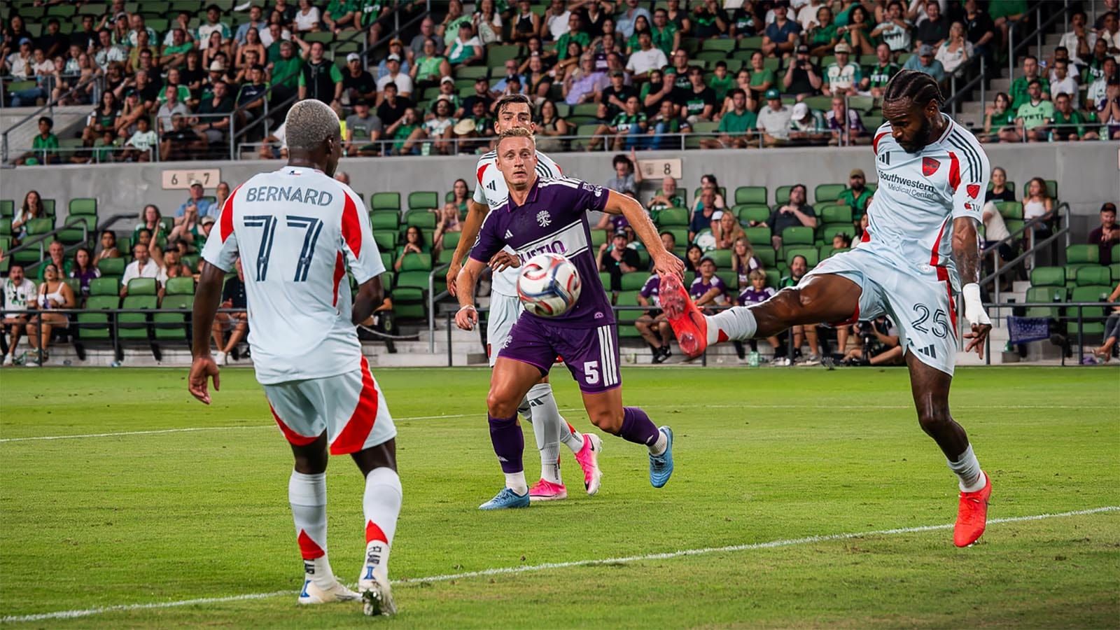 Austin FC's Oleksandr Svatok, surrounded by FC Dallas players