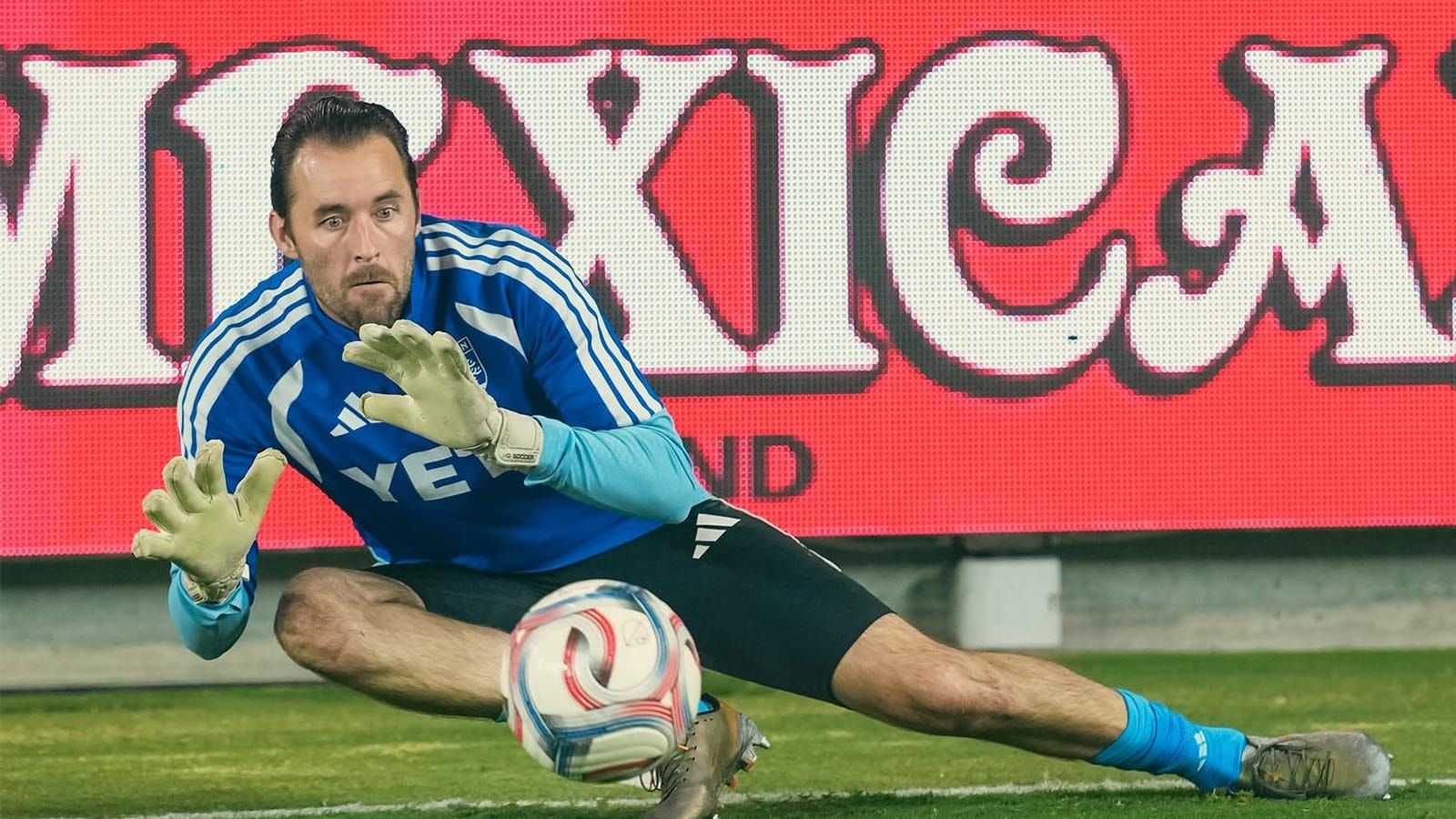 Brad Stuver stopping a ball in warmups prior to the match with Austin FC