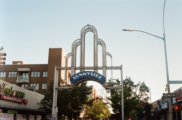 A sign that says "Sunnyside" in the Sunnyside neighborhood of Queens, NYC