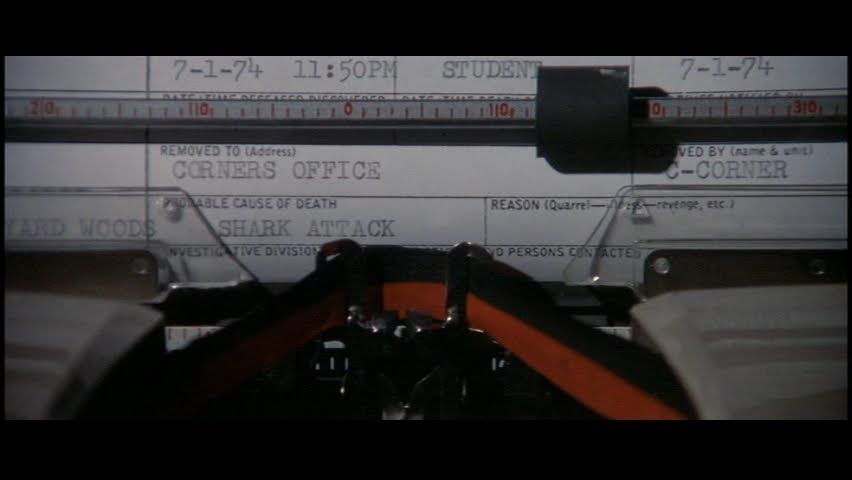 A close-up of the typewritten police report attributing Watkins' death to a shark attack