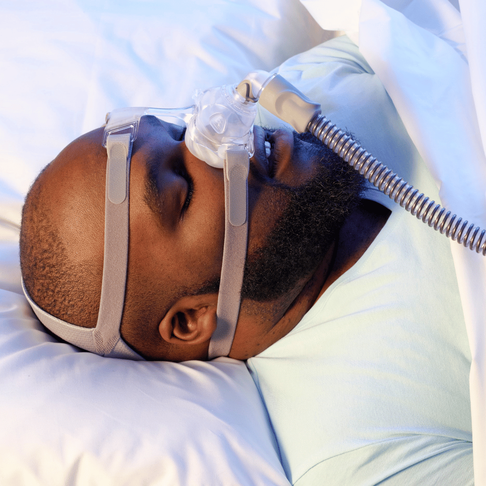 Man using CPAP sleep mask