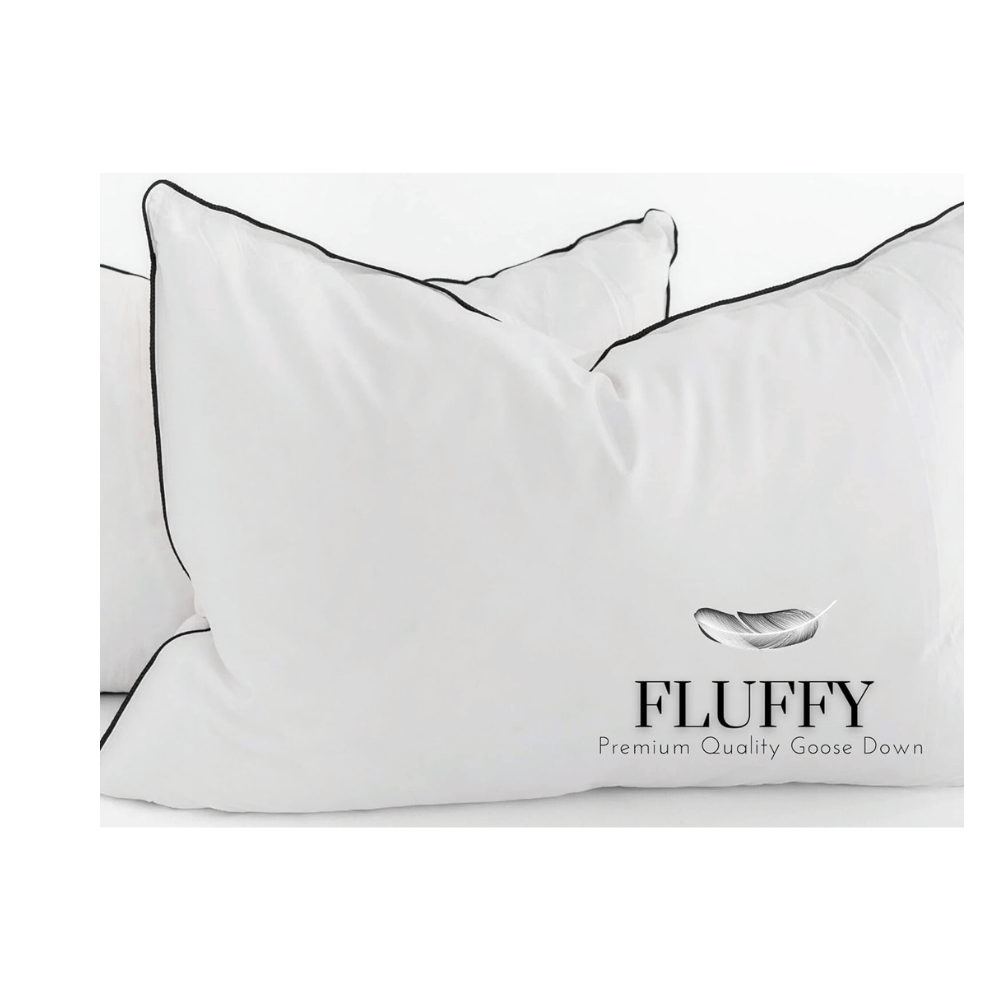 close up of goose down pillow with black piping and feather logo on white fabric (C: Maison Des Garçon/Amazon)