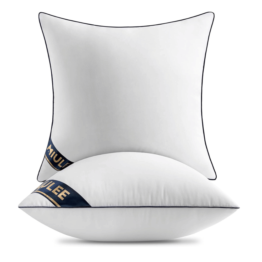 pair of MIULEE pillow inserts with black piping and branded navy corner label for sofa styling (C: MIULEE/Amazon)