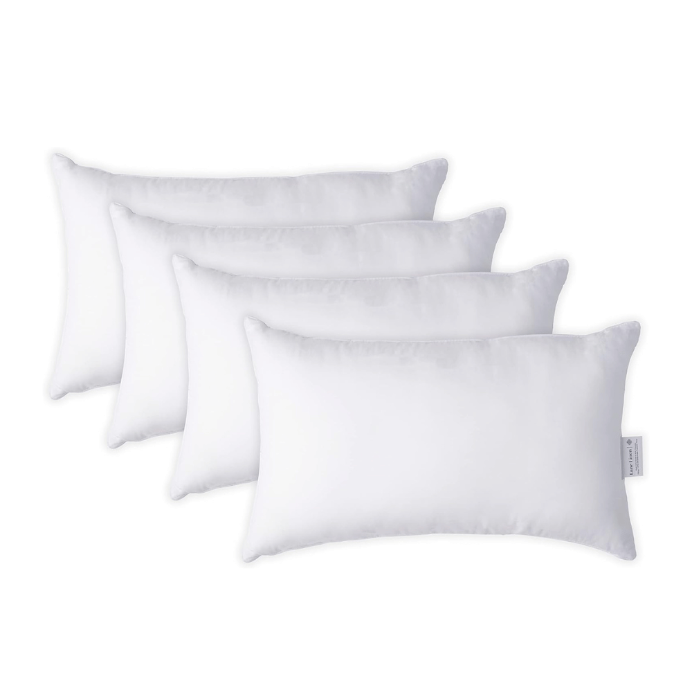set of four Lane Linen pillow inserts lined in row against white background (C: Lane Linen/Amazon)