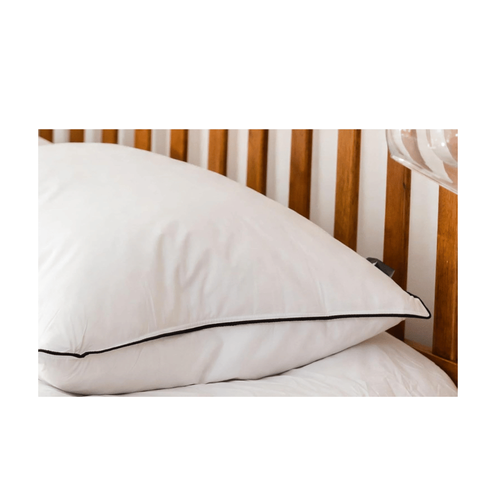 side view of luxury goose down pillow showing loft and smooth cotton shell (C: Maison Des Garçon/Amazon)