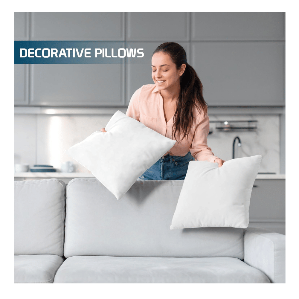 woman placing decorative throw pillows on modern sofa in stylish living room (C: Utopia Bedding/Amazon)