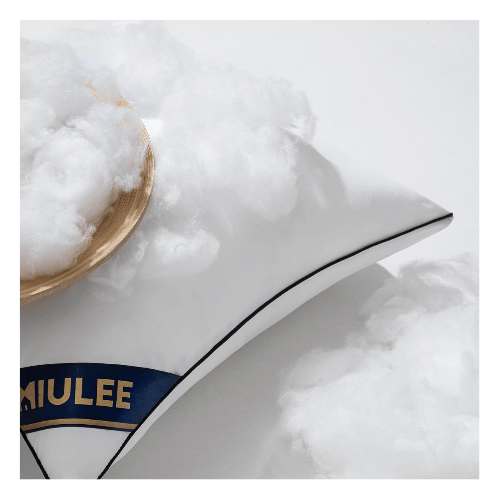 closeup of MIULEE pillow insert with fluffy fiber filling and piped cotton shell (C: MIULEE/Amazon)