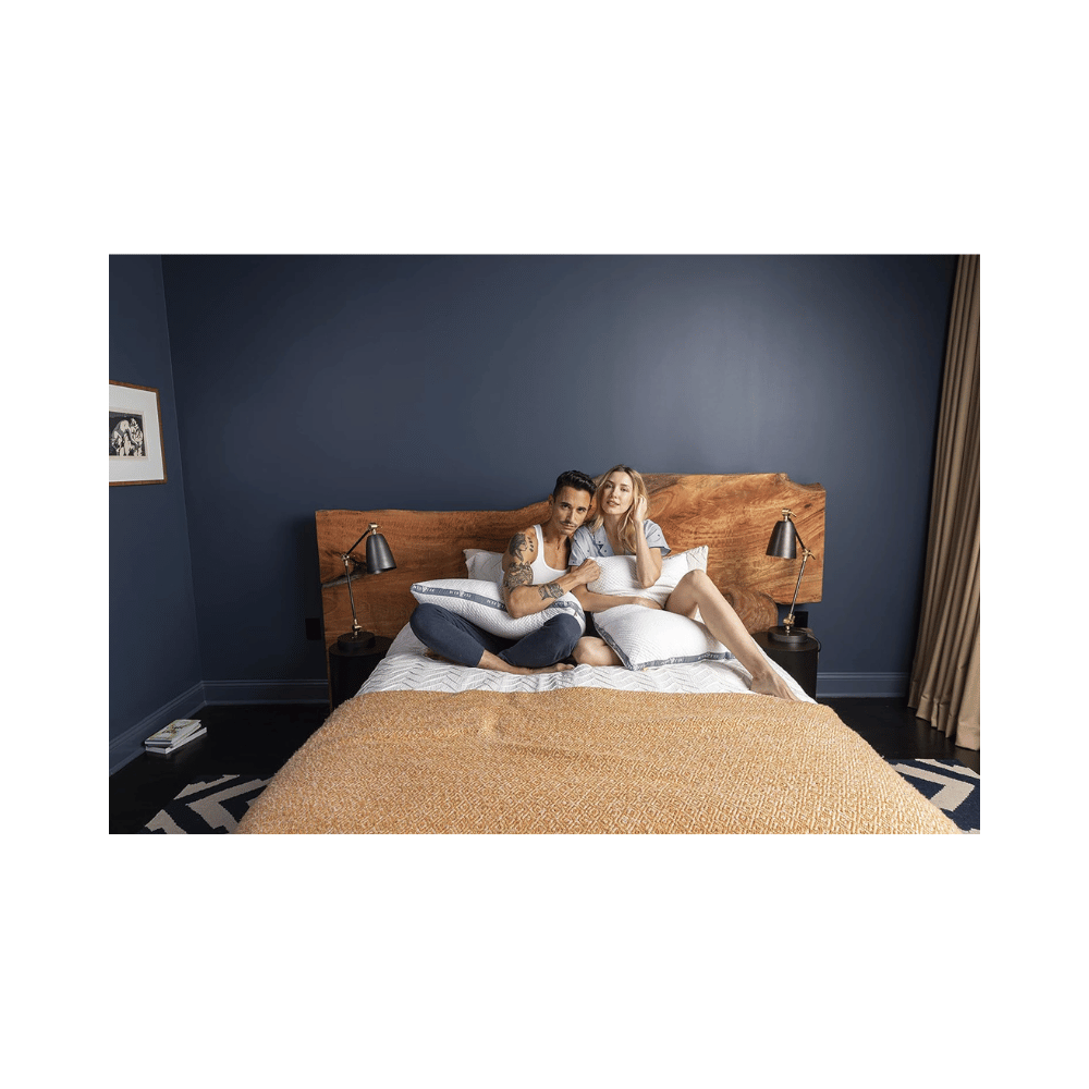  Couple relaxing on bed