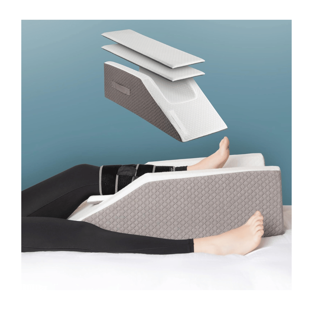 Adjustable leg pillow for back sleepers