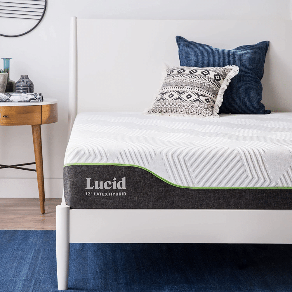 lucid latex hybrid mattress on white bed frame with pillow setup