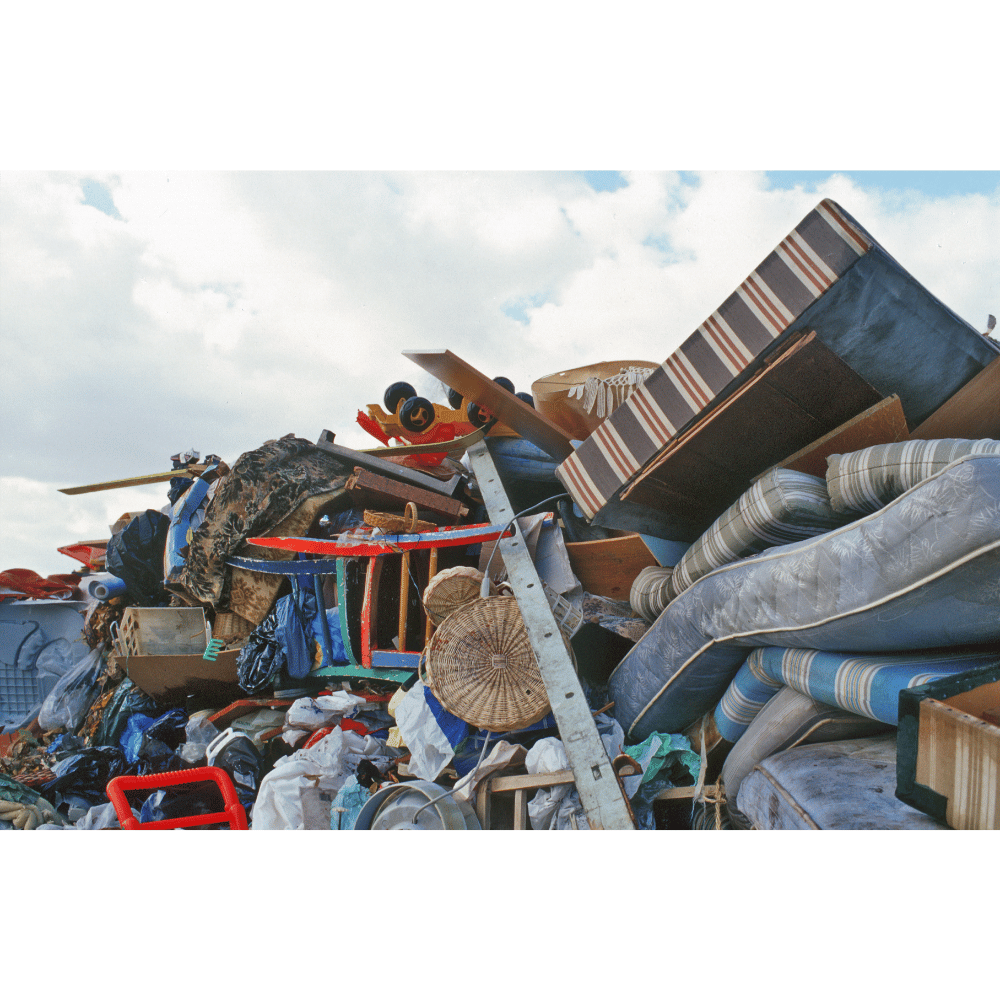 Trash pile with mattresses