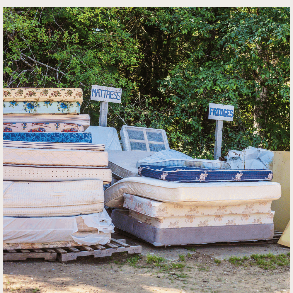 Stacked old mattresses