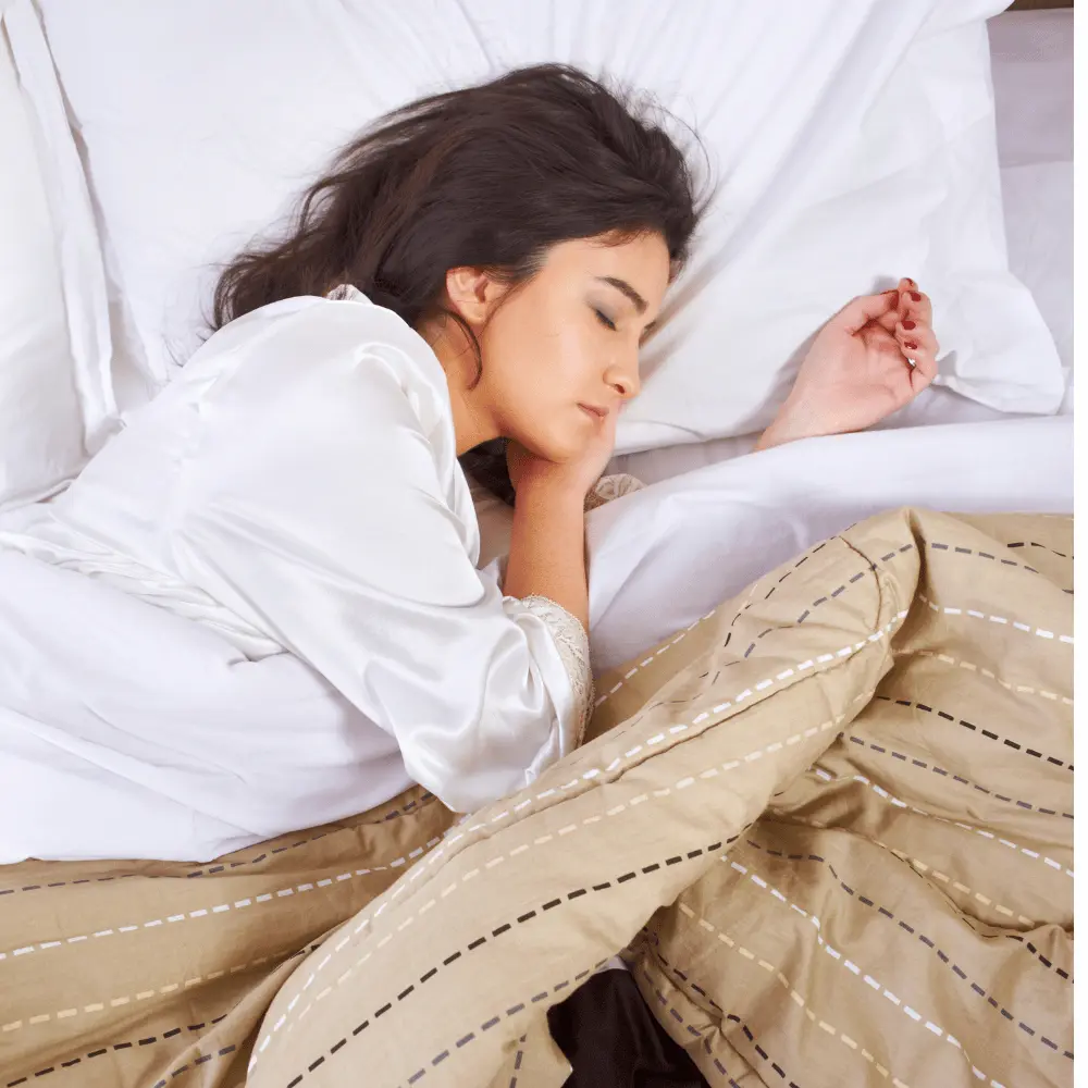 Woman sleeping silk bedding