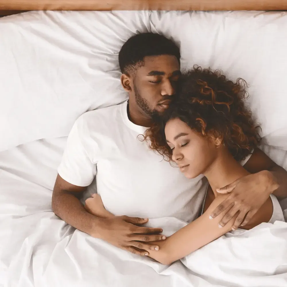 Couple cozy nighttime sleep