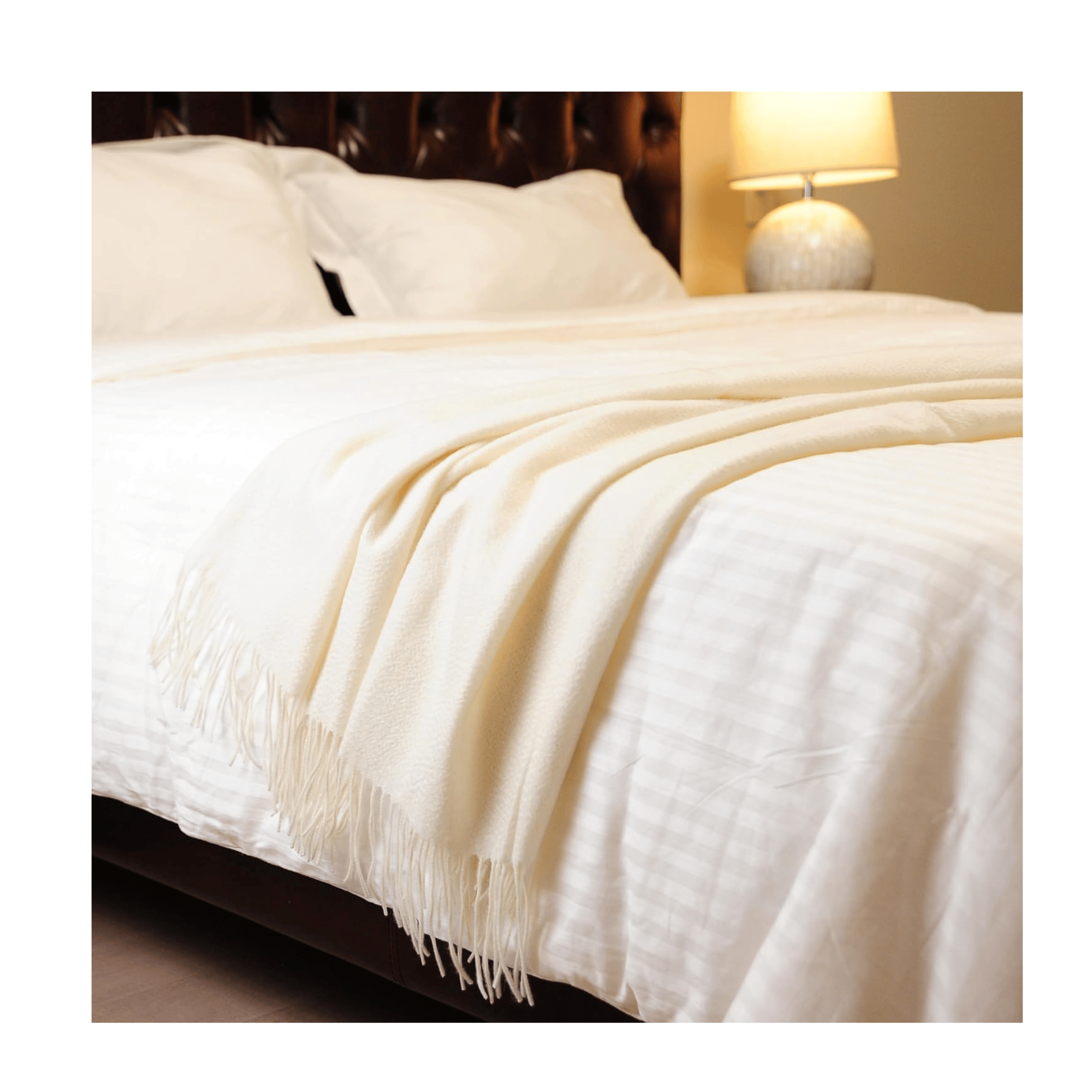 Cuddle Dreams cashmere throw on bed