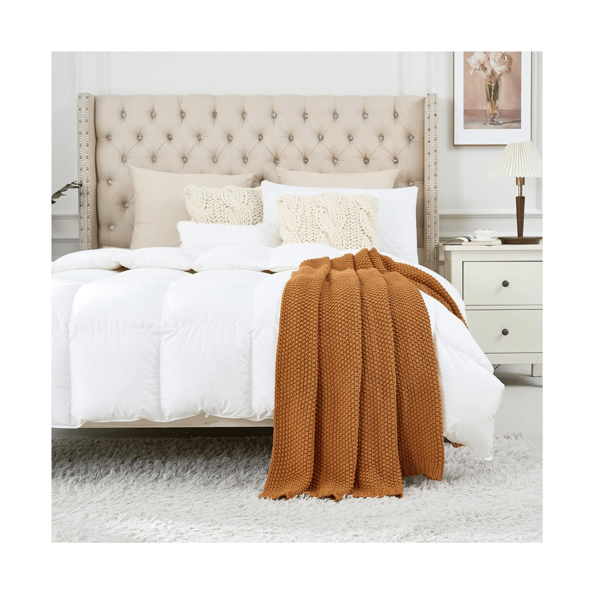 Chunky cable knit throw on bed