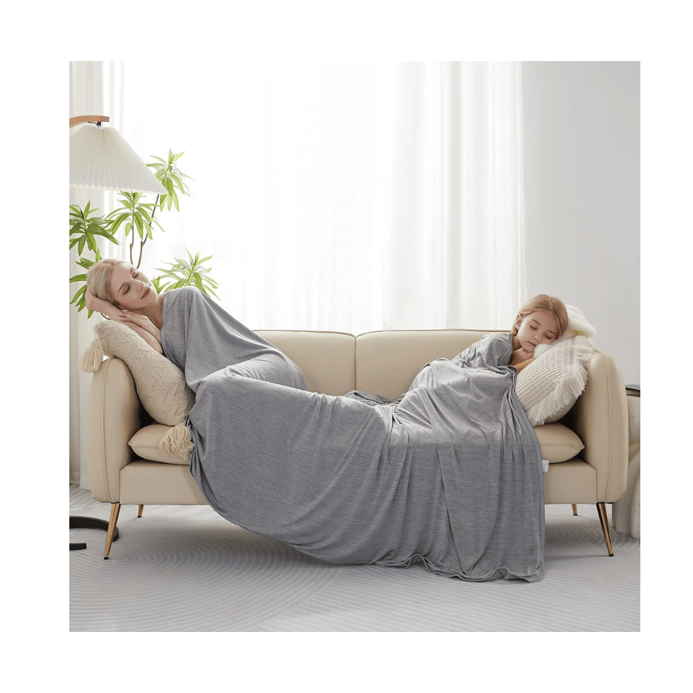 Two people relaxing under Marchpower cooling blanket gray soft lightweight fabric