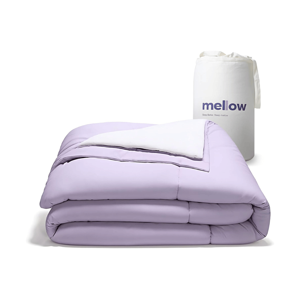 Mellow lavender comforter folded with storage bag temperature control blanket