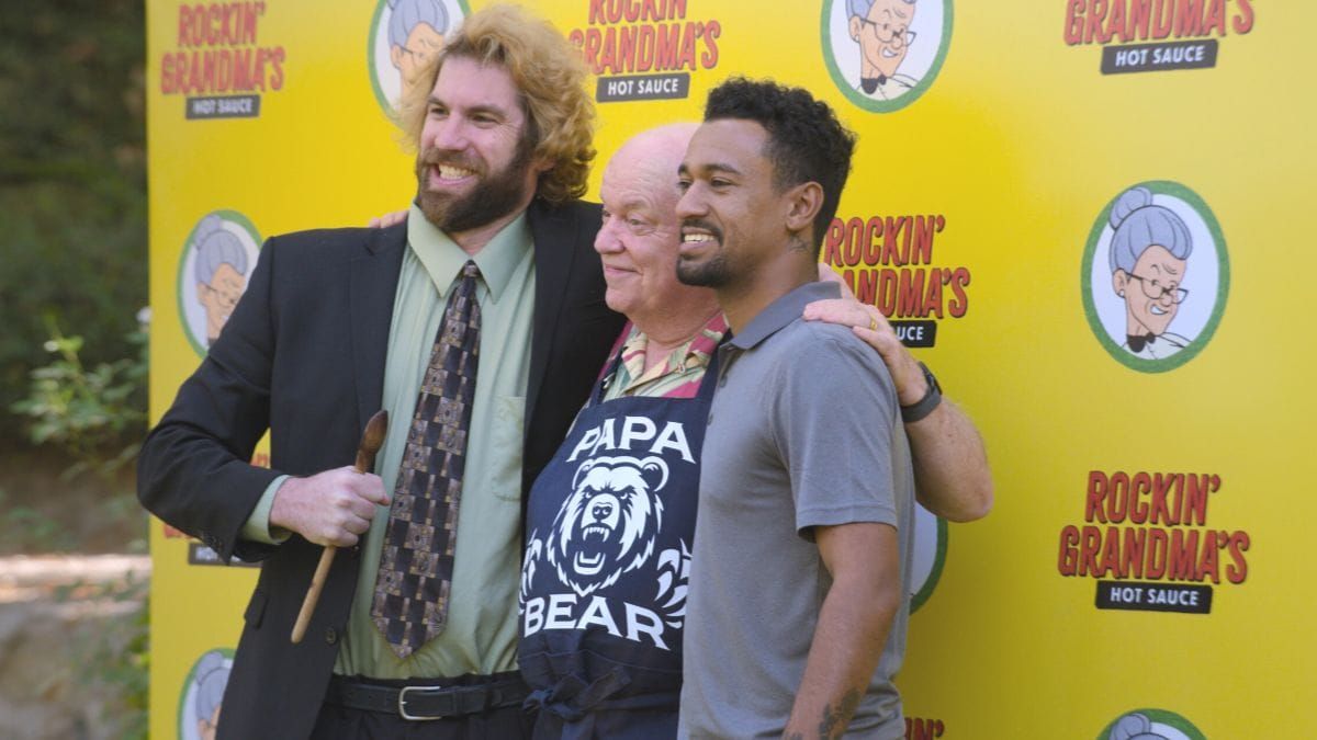 Alex Bonifer as Dougie Womack, Anthony Norman as himself, and Jerry Hauck as Doug Womack in Jury Duty Presents: Company Retreat. (Photo Credit: Courtesy of Prime Video.)