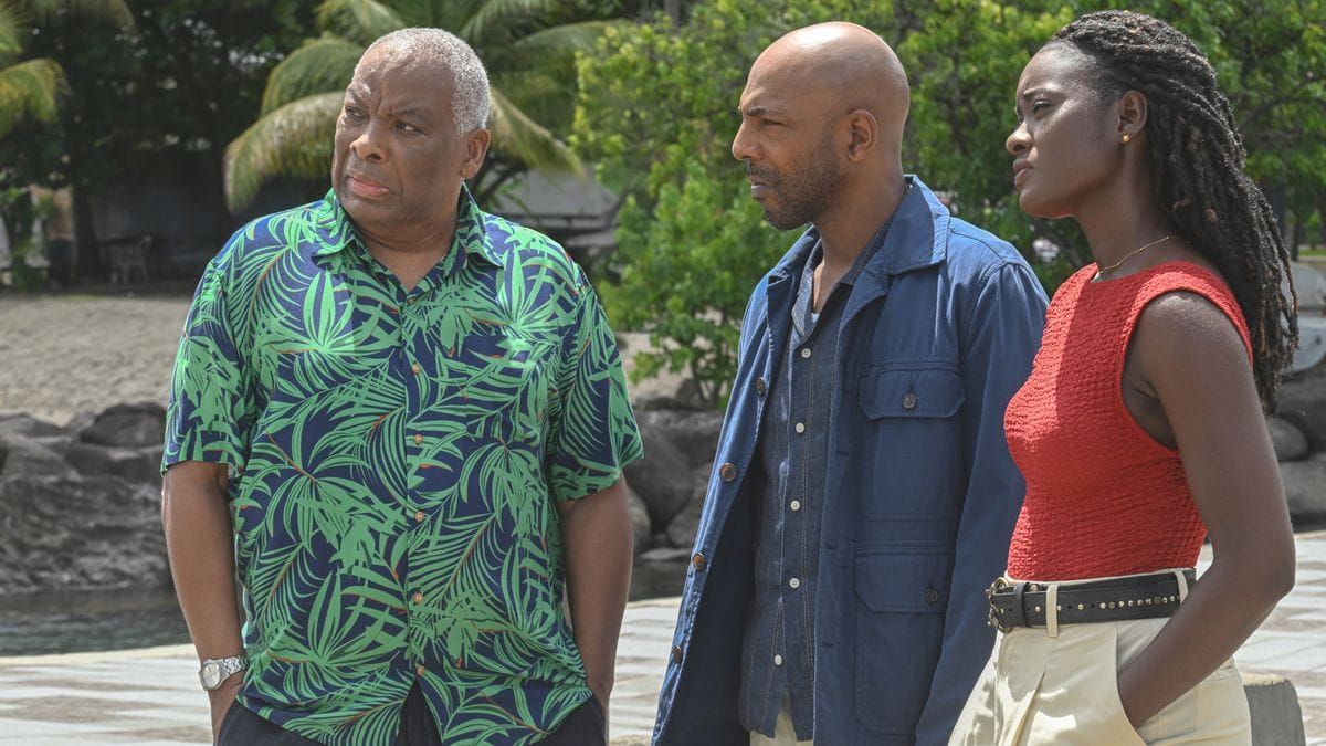 Don Warrington as Commissioner Patterson, Don Gilet as Mervin Wilson and Shantol Jackson as Naomi Thomas in Death in Paradise season 15. (Photo Credit: Courtesy of BritBox.)