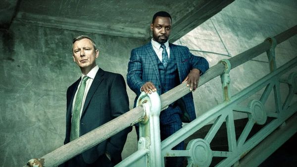 Actor John Simm as Roy Grace and actor Richie Campbell as Glenn Branson in Grace. (Photo Credit: Courtesy of ITV.)