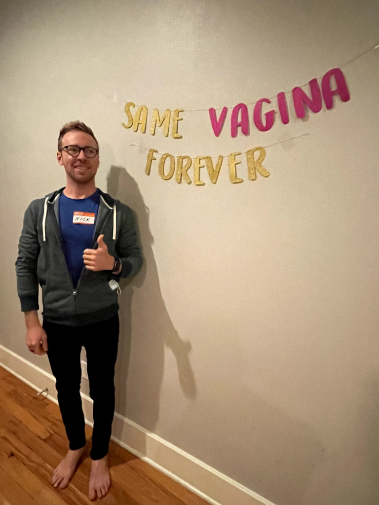 Nick in an awkward pose (&nbsp;I guess its because of the signage )