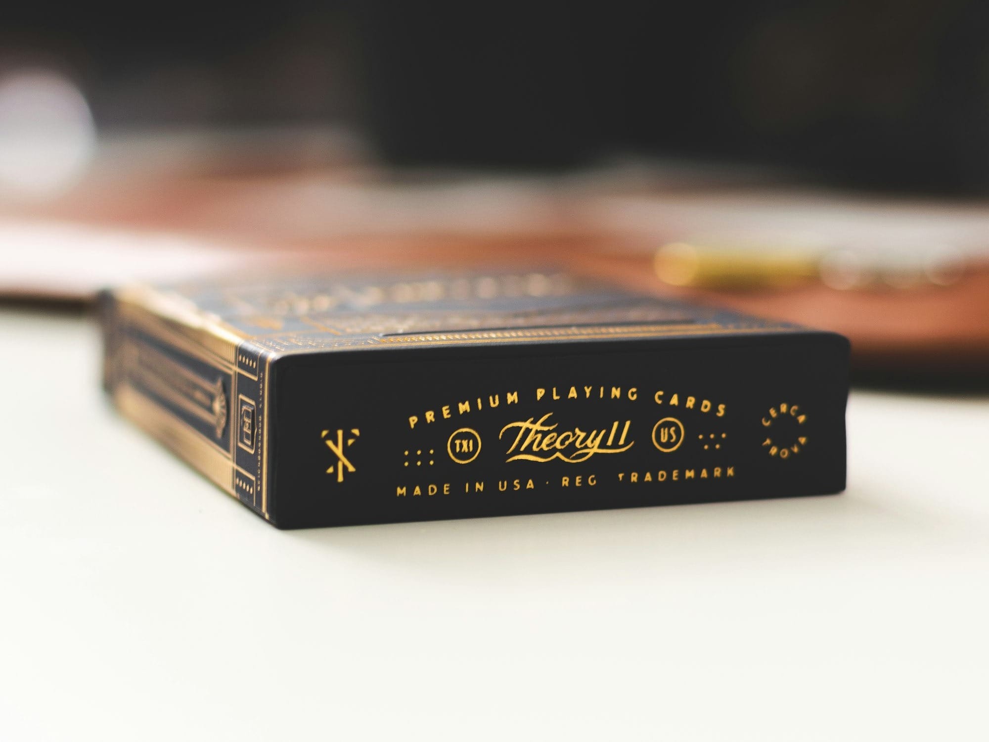 Theoryll playing cards box on white board