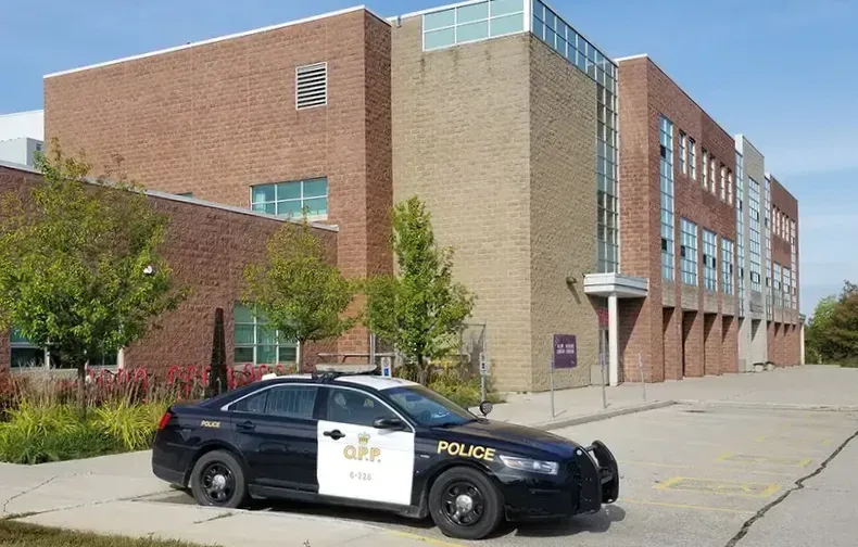 Province pushes boards to bring back school resource officers