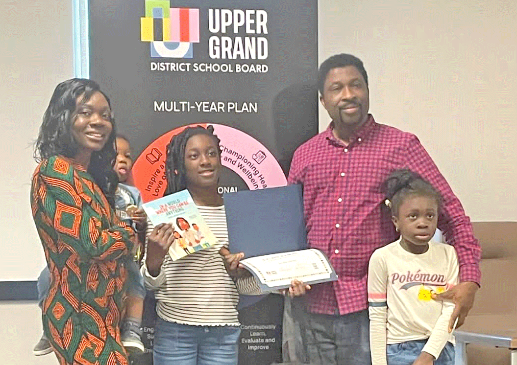 Fergus student Charis Alabi receives Ovation Award from school board