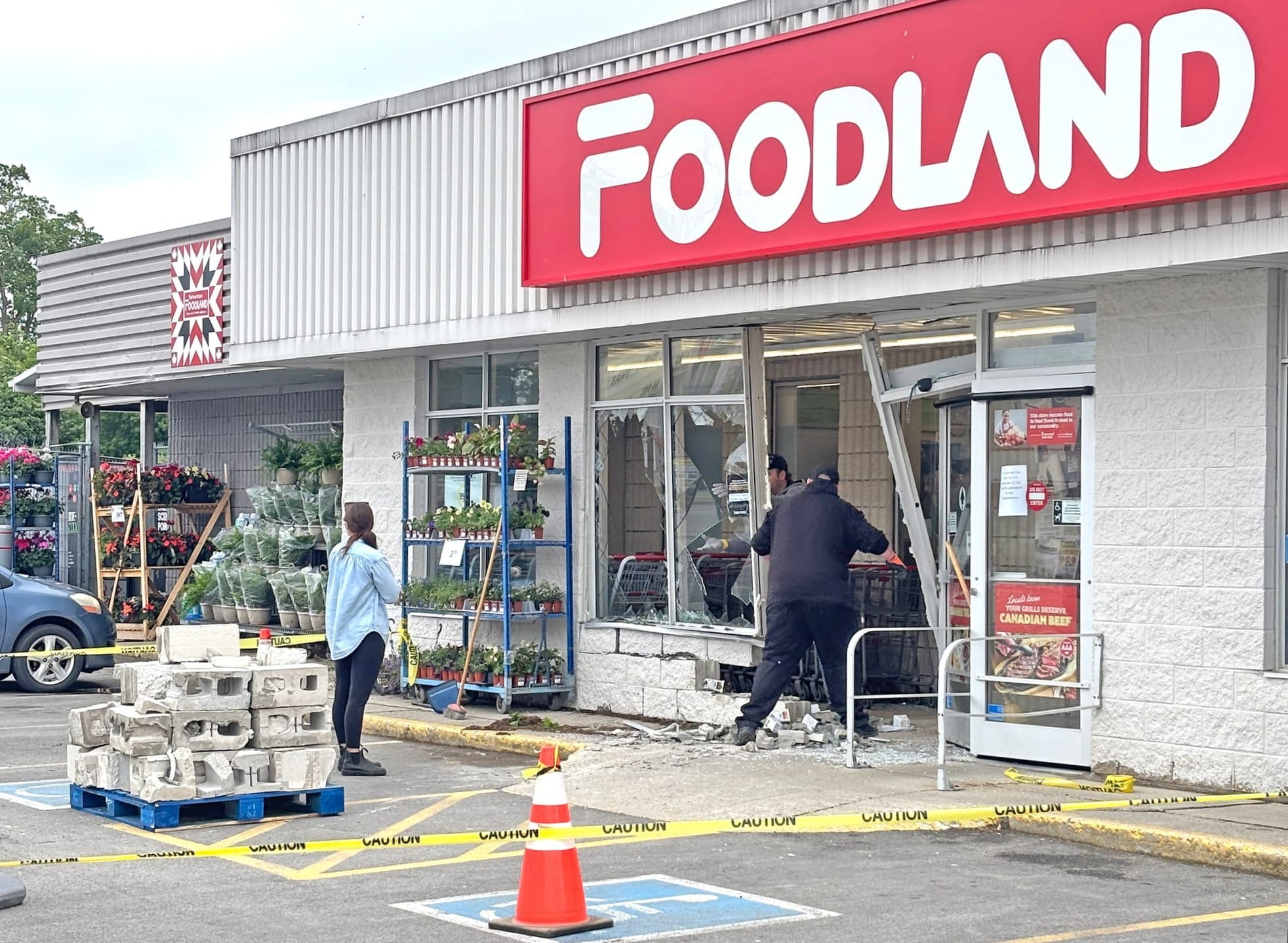 Vehicle smashes into front of local grocery store