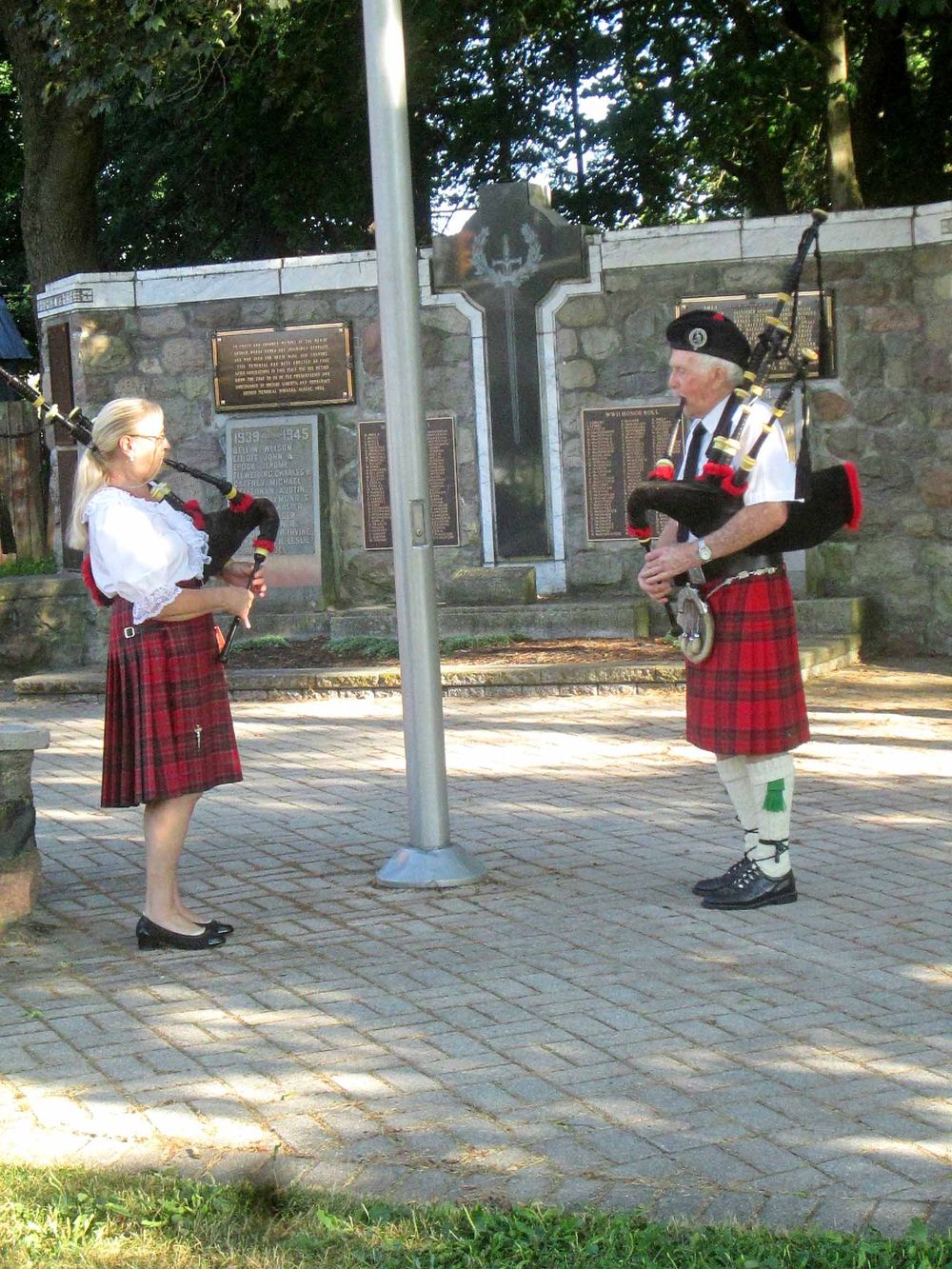 Pipers and dancers entertain crowd in Arthur post image