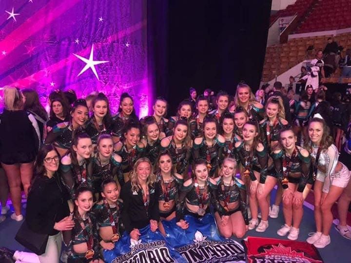 Cheerleaders earn trip to global competition post image