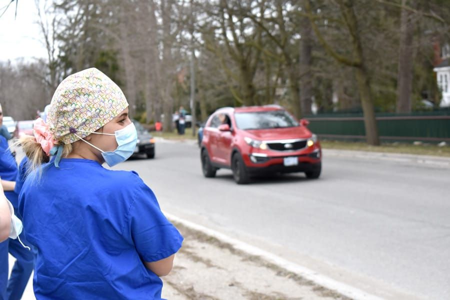 Car rally shows some love for healthcare workers post image