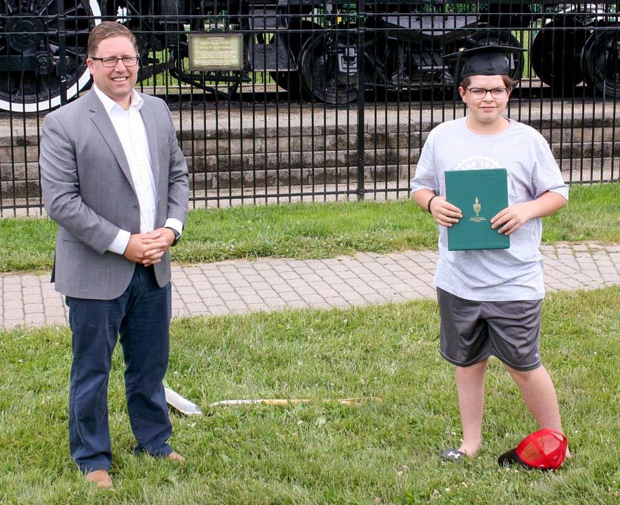 MP gives graduation gift to Palmerston student post image