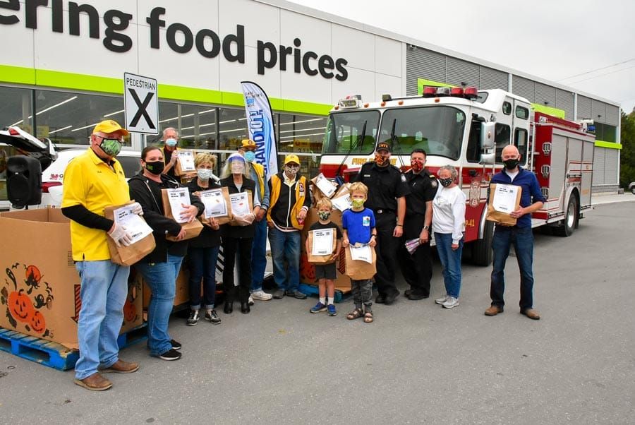 Food bank food drive a team effort, raising $2,700 post image