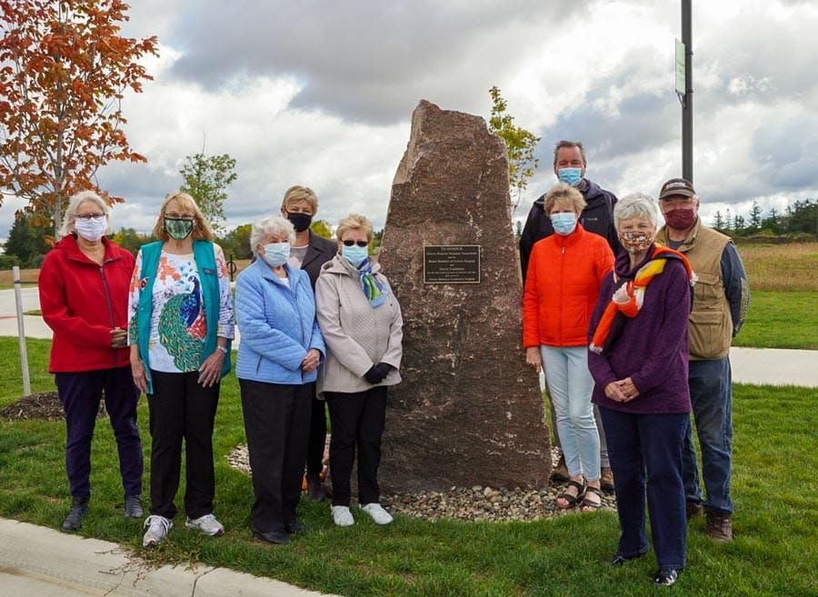 Groves volunteers recognized with  rock unveiling, street naming post image