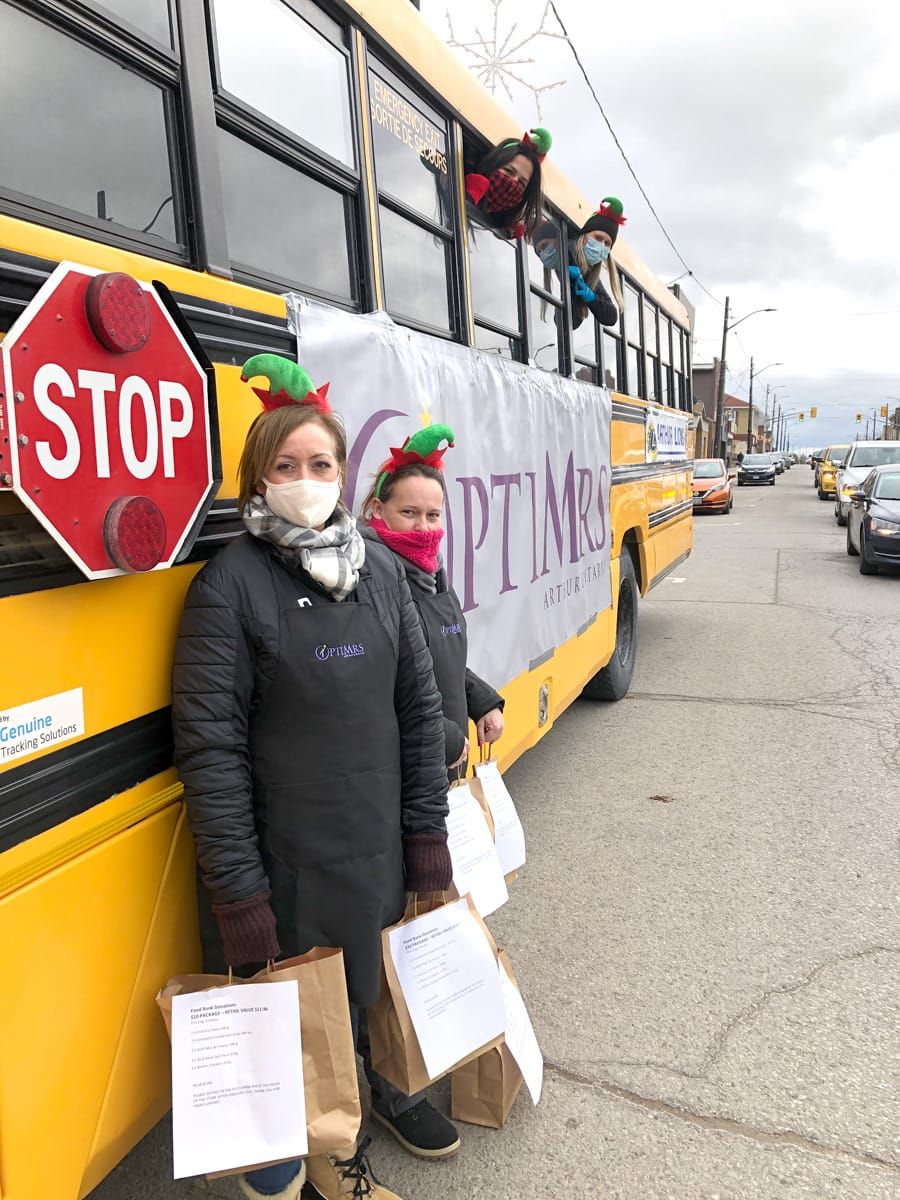Arthur Optimrs Club fill a bus for local food bank post image