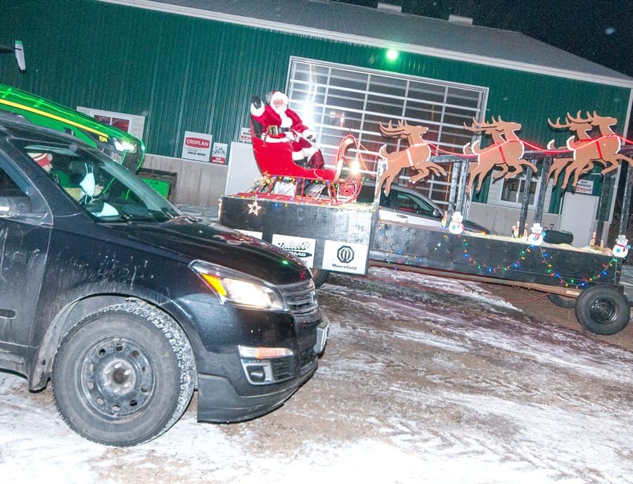 Optimist Club of Moorefield and Hensall Co-op teamed up for the Santa parade in reverse post image