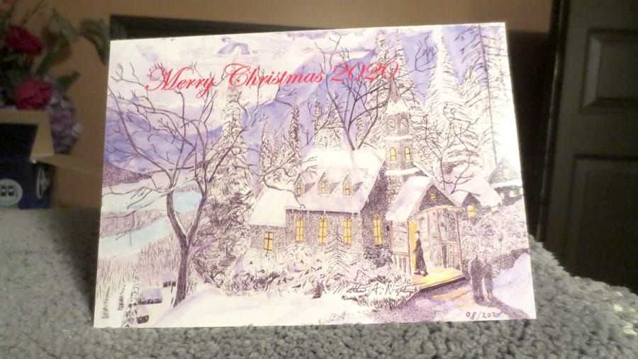 Local artist makes Christmas cards; raises $900 for food bank post image