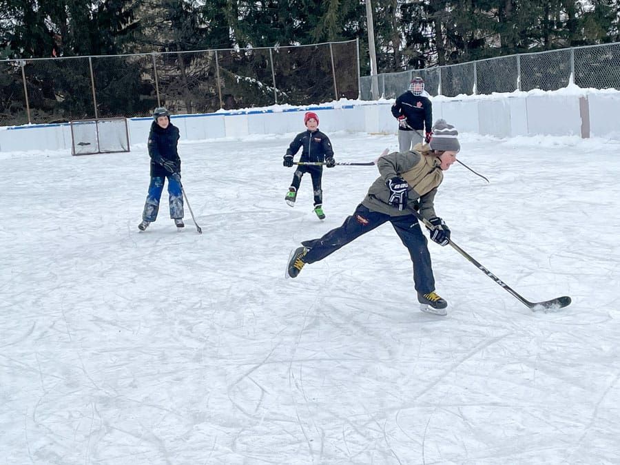 Pick-up hockey action at the Alma Optimist Club ice rink post image