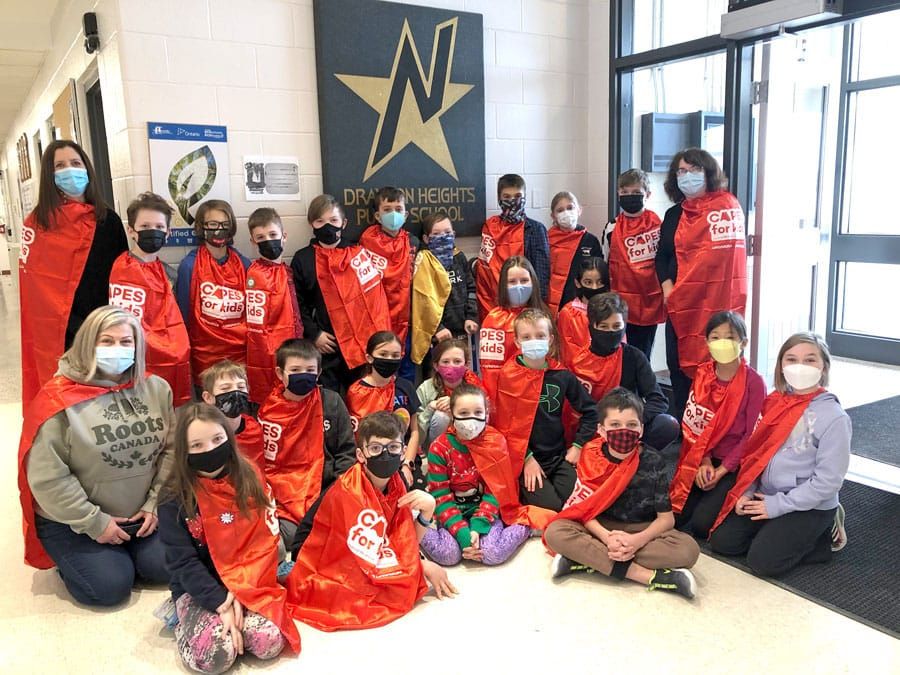 Classmates don capes in support of children’s hospital campaign post image