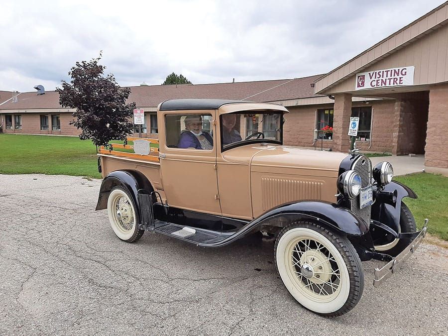 Caressant Care Arthur residents treated to car show post image