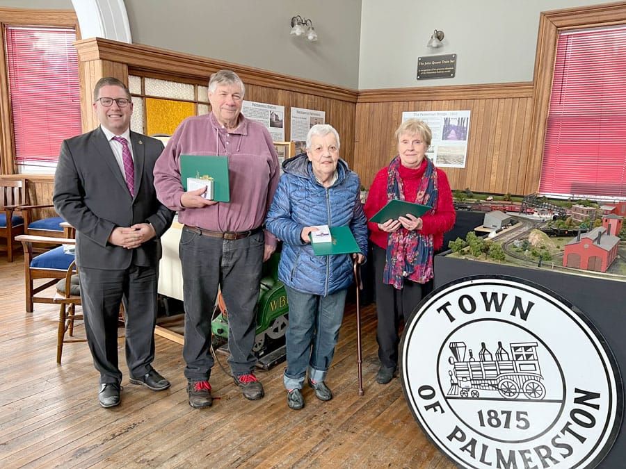 Jubilee pins presented to local residents post image