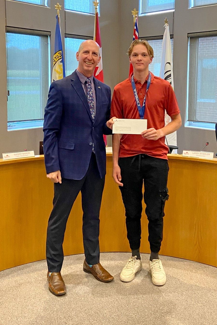 Mayor Gregg Davidson presents Township of Mapleton athletic bursary post image