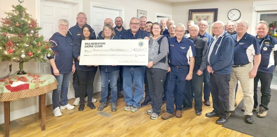 Palmerston Lions Club presents check to Palmerston Food Bank post image