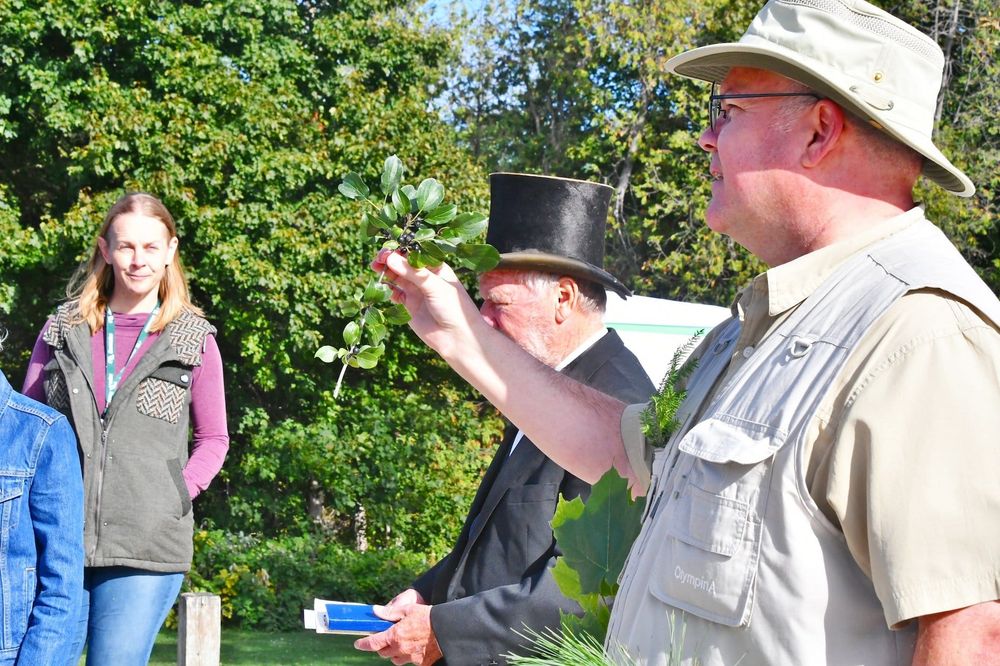Tree Trust members take in some sun at the Tree Trust Walk Sept. 20 post image