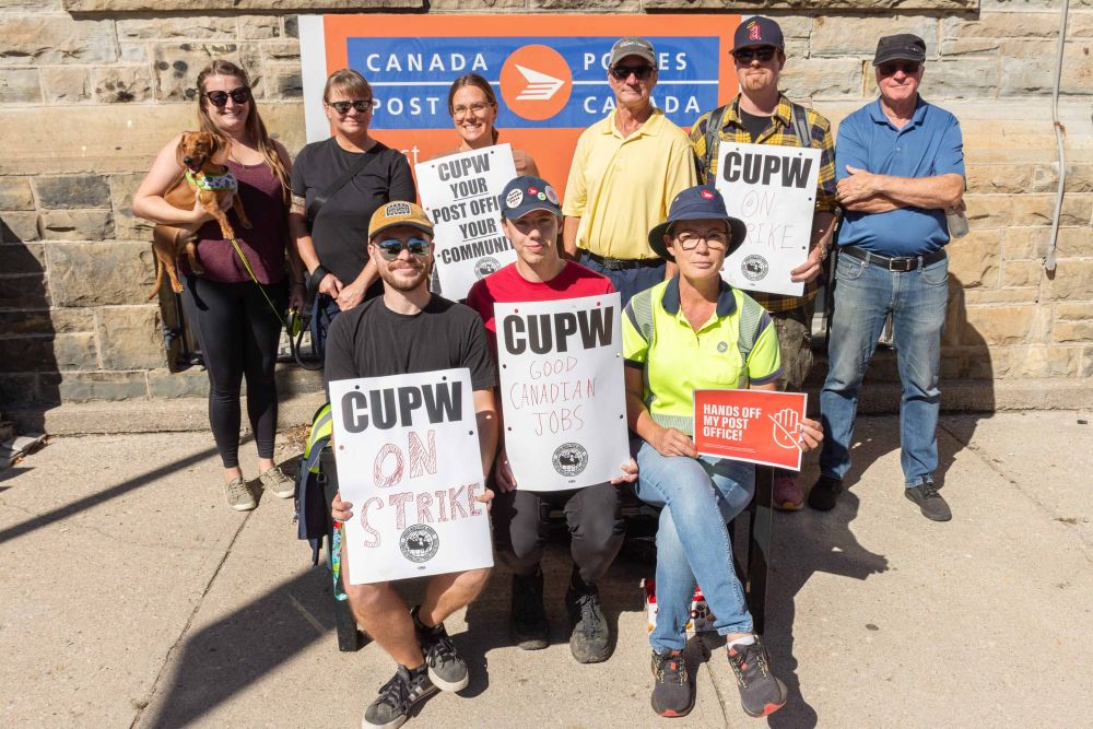 Postal workers strike after feds move to end home delivery post image