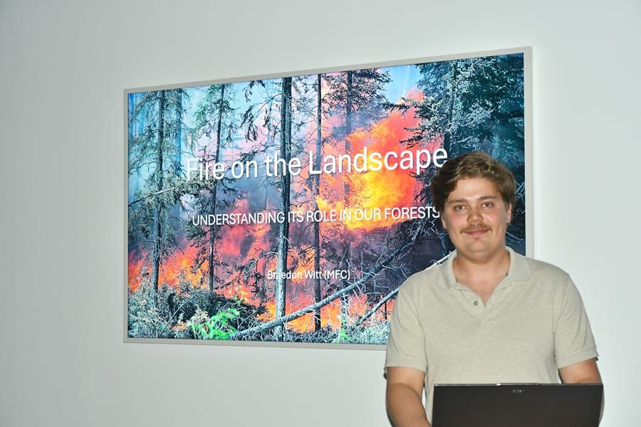 Braedon Witt of Tree Trust discusses forest fires at Neighbourwoods meeting post image